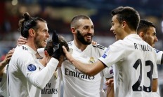 爱游戏课程-皇家马德里队员全力以赴，取得胜利